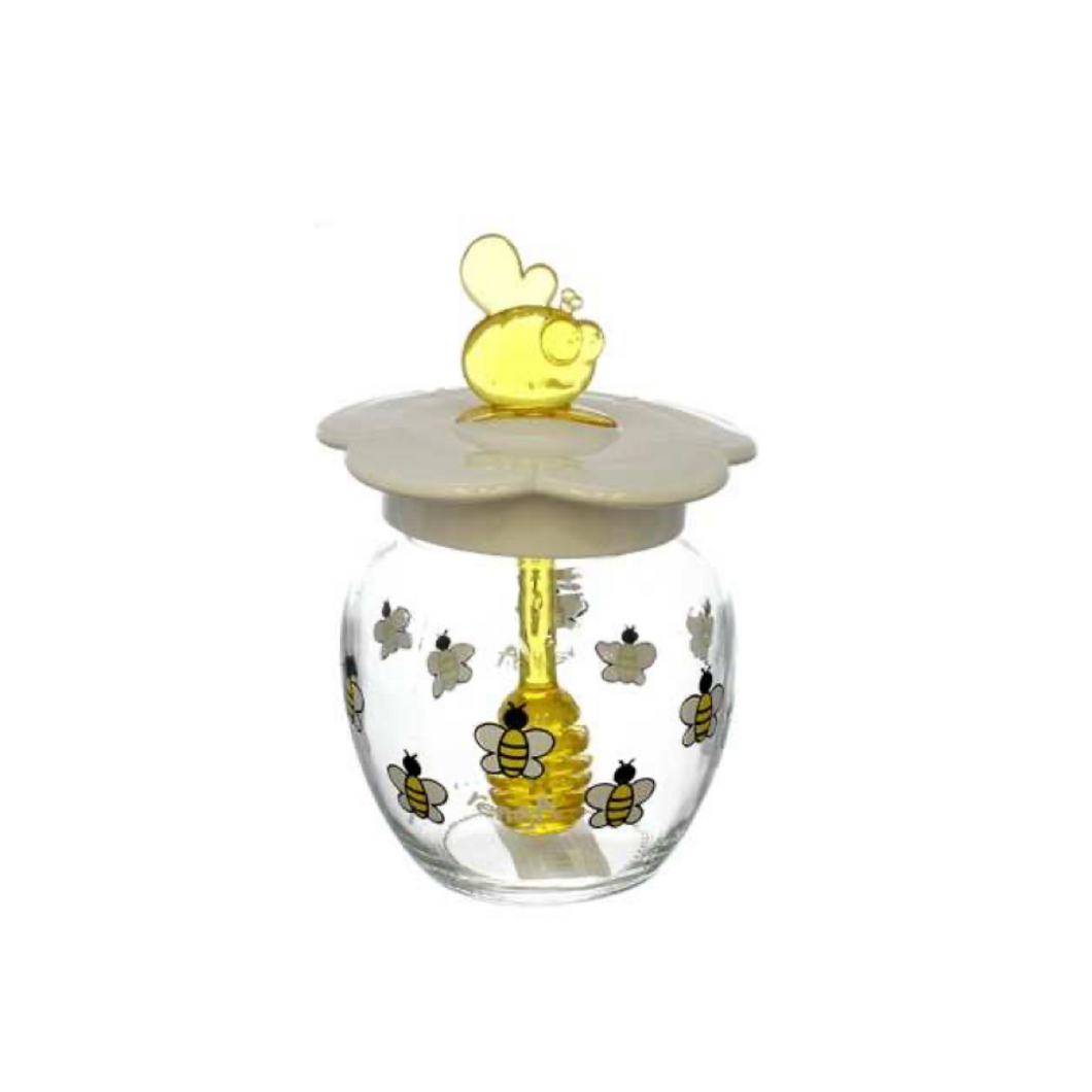 Decorated honey jar with lid and spoon